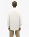 Back view of TIGER OF SWEDEN Spenser shirt with split yoke and rounded hem by eightywingold