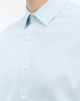 Detail of TIGER OF SWEDEN square cuffs with pleats and double-button closure in Light Blue from eightywingold