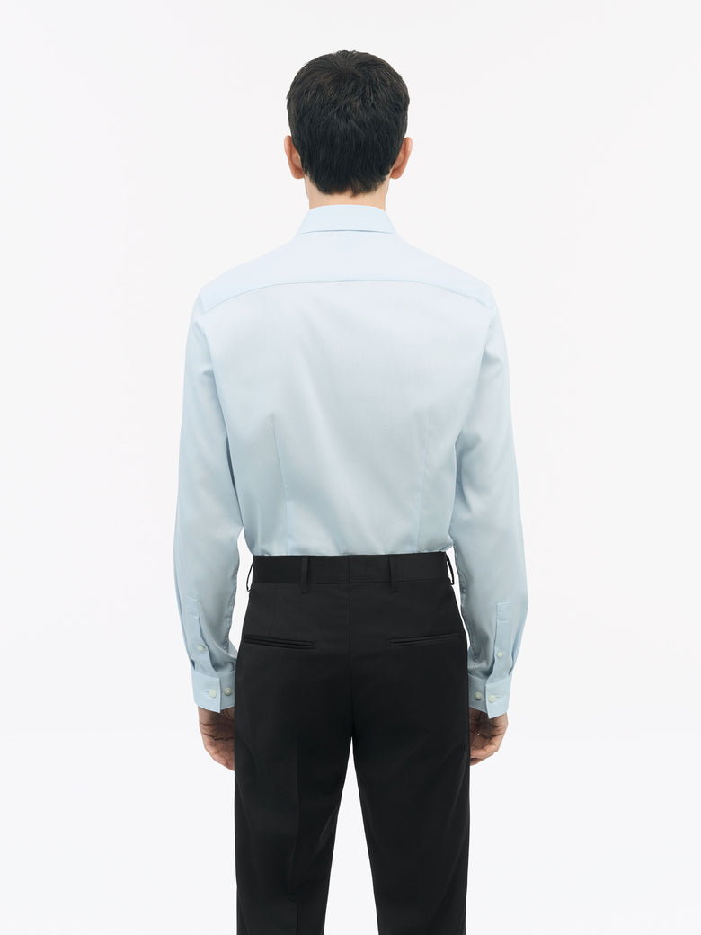 Back view of TIGER OF SWEDEN Filbrodie shirt with darted back and split yoke in Light Blue from eightywingold