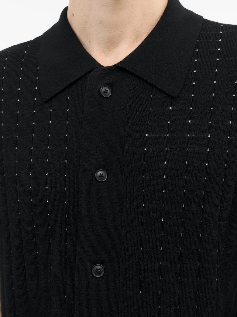 Close-up of TIGER OF SWEDEN jacquard knit detail and Merino cotton texture in Black from eightywingold