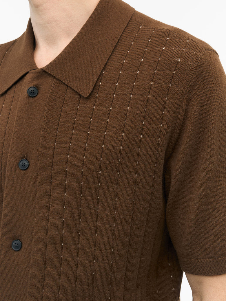 Close-up of TIGER OF SWEDEN jacquard knit texture and Merino cotton blend in Gold Brown from eightywingold