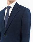 Front view of TIGER OF SWEDEN Justin blazer in Midnight Blue with welt pockets from eightywingold