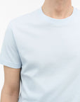 Close-up of TIGER OF SWEDEN ribbed neck trim on Dillan t-shirt in Light Blue from eightywingold