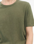 Close-up of TIGER OF SWEDEN chest logo on Olaf L linen blend t-shirt in Dusty Green from eightywingold