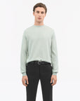 Side view of TIGER OF SWEDEN Pale Grey Blue Connor knit with French shoulders from eightywingold