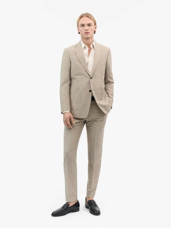 Back view of TIGER OF SWEDEN double vented linen blend Justin blazer in Pale Sand from eightywingold