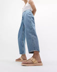 FitFlop HE7 women's ergonomic sandals with T-bar design, soft leather straps, cork-edged sole, and Microwobbleboard™ cushioning.