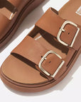 Top-down image of Light Tan FITFLOP comfort sandals in Canada with adjustable straps and leather lining