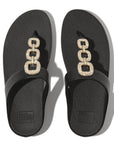 HX2 001 Black ergonomic sandals by FitFlop featuring a sleek leather T-bar, shimmering crystal-chain accents, and APMA-approved cushioning support.