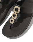 Elegant FitFlop HX2 001 Black sandals with soft toe-post leather, recycled zinc chain design, triple-density midsole, and natural arch support.