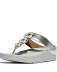 Stylish and supportive IBO 011 Silver sandals by FitFlop – featuring ergonomic sole, recycled zinc hardware, and cushioned leather toe post.