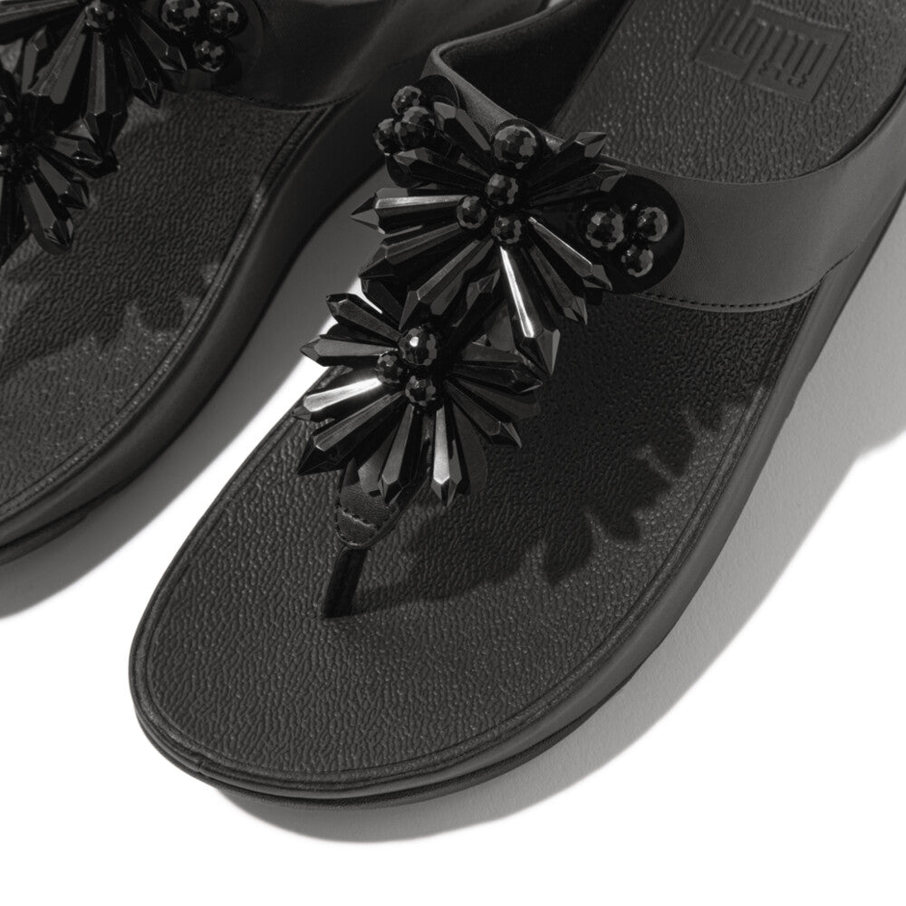 Black FitFlop IE6 001 sandals with sparkling crystal details, microfibre toe post, and triple-density Microwobbleboard™ sole for all-day support.