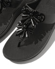 Black FitFlop IE6 001 sandals with sparkling crystal details, microfibre toe post, and triple-density Microwobbleboard™ sole for all-day support.