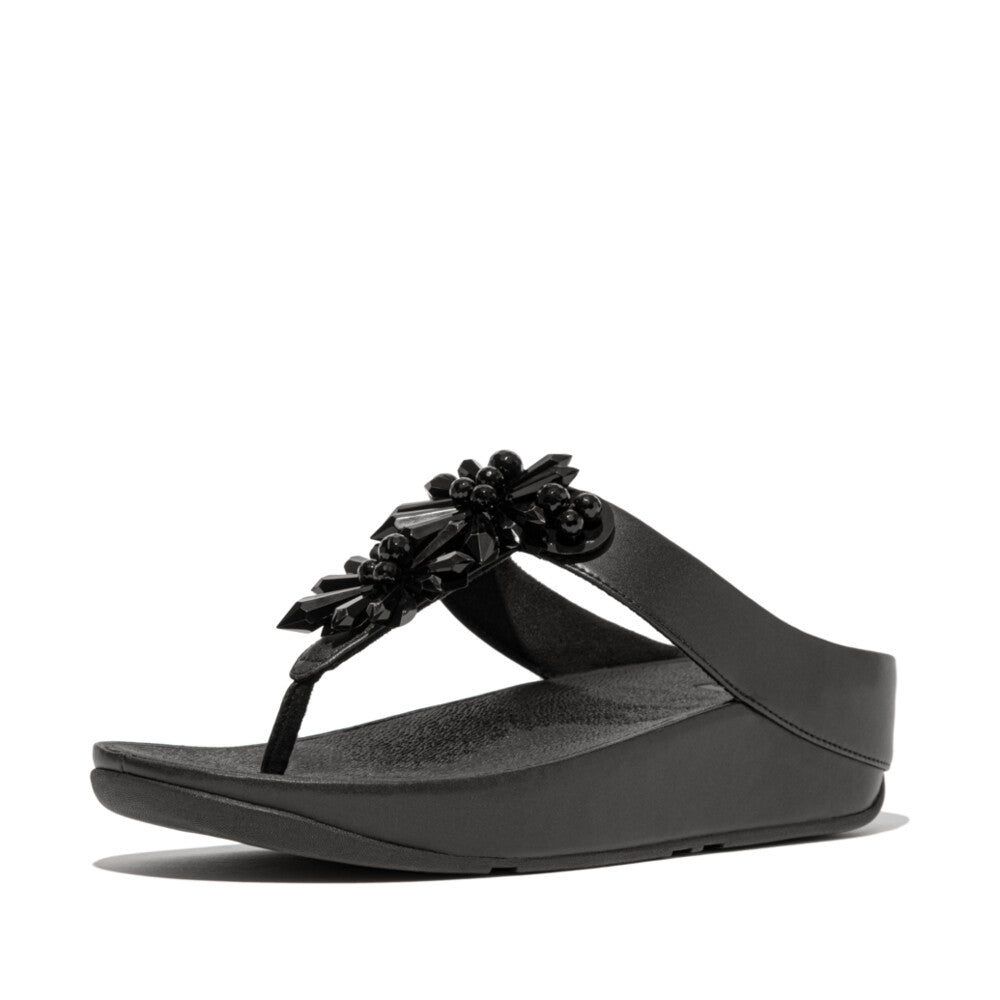 FitFlop IE6 001 Black sandals for women – shimmering starburst crystals, faux-leather wrap, APMA-approved support, and all-night comfort.