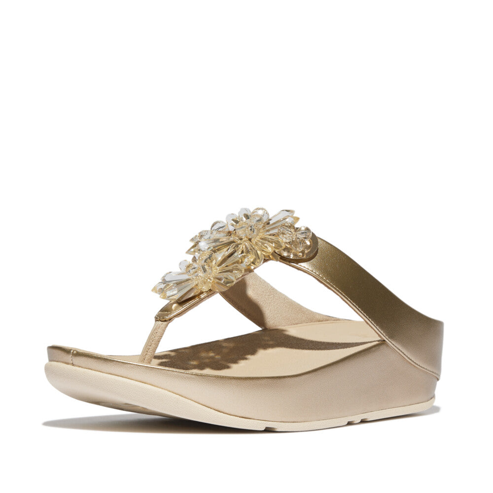 FitFlop IG9 675 Platino sandals in metallic faux-leather with starburst crystal embellishments and APMA-approved ergonomic cushioning – elegant Canadian footwear.