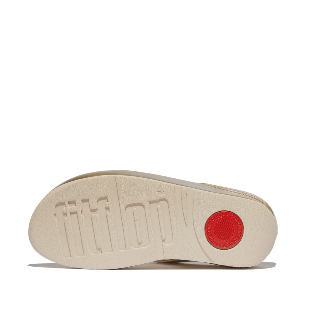 IG9 675 Platino women’s sandals by FitFlop with clear crystal clusters, Microwobbleboard™ midsoles, and gold shimmer straps – made for comfort and style.