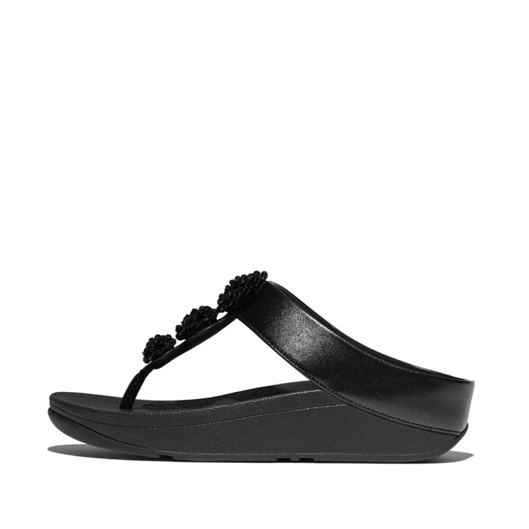 FitFlop Fino Beadie Button Metallic Sandals in Black IU1. Featuring a sleek toe-post design, sparkling bead embellishments & all-day comfort with Microwobbleboard™ midsoles. Shop now! Official FitFlop partner. Free shipping & returns in Canada.