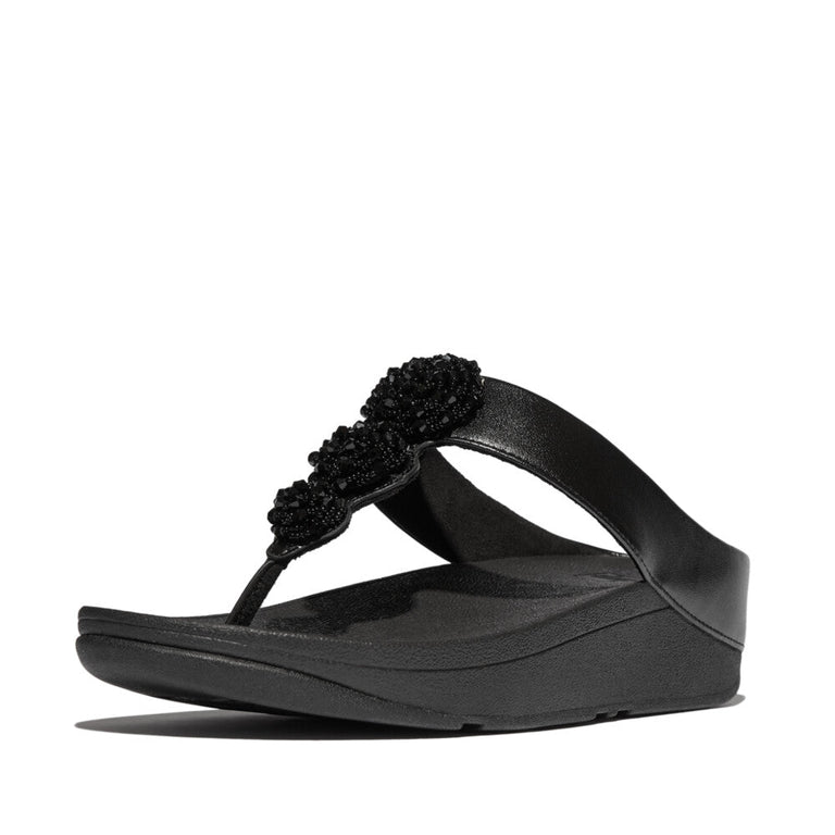 Women's black metallic FitFlop toe-post sandals IU1 with comfort Microwobbleboard midsoles.