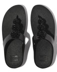 Elegant black FitFlop Fino sandals IU1 for women with metallic finish and beaded button design
