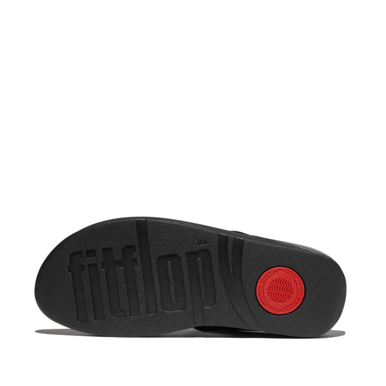 Step out in style with FitFlop’s Fino Beadie Button Metallic Toe-Post Sandals in Metallic Black IU1, featuring dazzling bead details and ergonomic comfort soles.