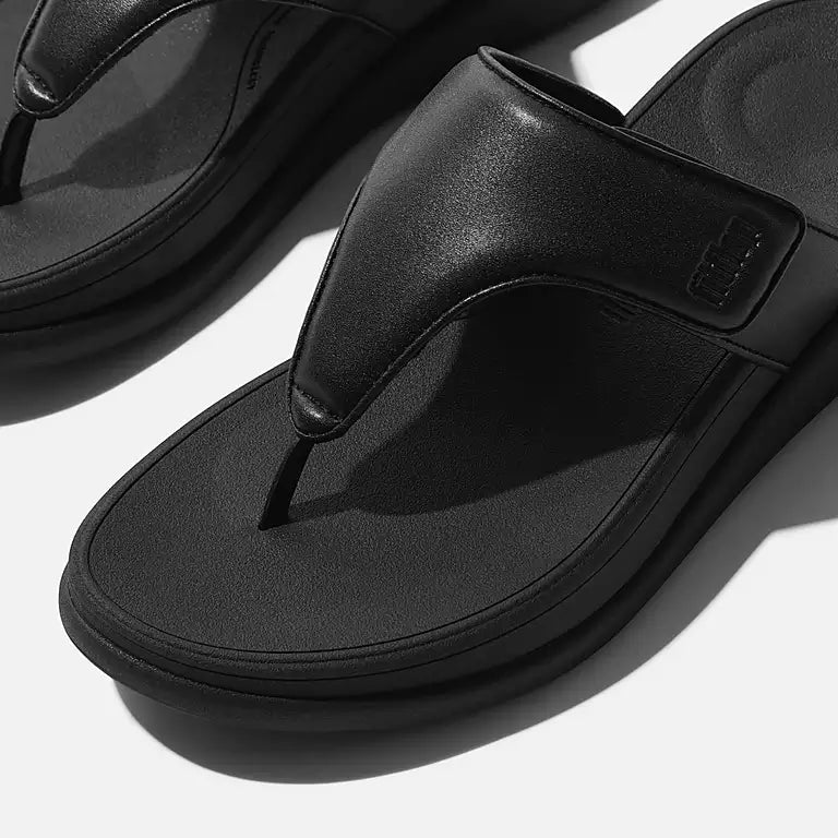 FITFLOP All Black minimalist toe post sandals with adjustable strap and support in Canada