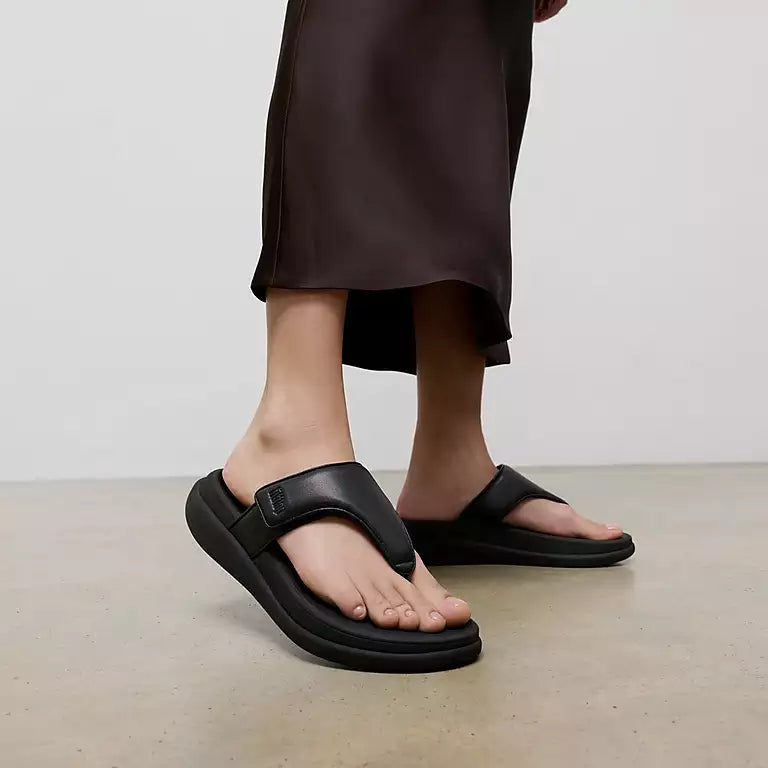 FITFLOP All Black streamlined comfort sandals with arch support and road grip in Canada