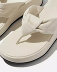 Side view of Paris Beige FITFLOP sandals in Canada featuring padded leather strap and ergonomic cushioning