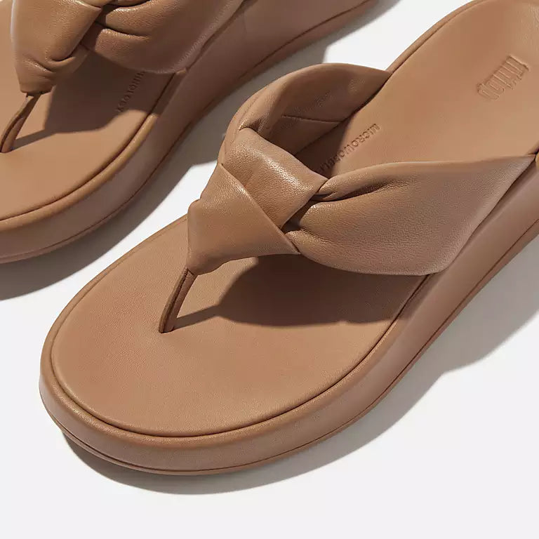 FITFLOP elevated slip on sandals in Classic Tan with sculptural straps and cushioned soles in Canada
