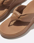 FITFLOP elevated slip on sandals in Classic Tan with sculptural straps and cushioned soles in Canada