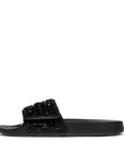 Side view of All Black FITFLOP iQushion crystal slider sandals in Canada with shimmer microfibre and jeweled straps