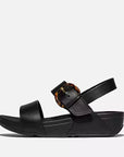 Side view of FITFLOP All Black back-strap sandals in Canada with smooth leather and APMA-approved comfort