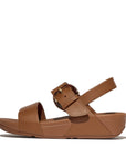 Side view of FITFLOP Deep Tan two-strap sandals in Canada with smooth leather and APMA-approved support