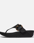 Side view of Black FITFLOP Lulu sandals in Canada featuring Microwobbleboard midsoles and padded upper