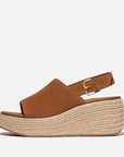Side view of Deep Tan FITFLOP sandals in Canada with brushed-metal buckle and contoured leather footbed