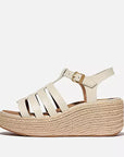 Side view of Paris Beige FITFLOP sandals in Canada with high wedge heel and recycled metal buckle