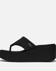 Side view of All Black FITFLOP high-heel sandals in Canada featuring CushX midsole and 90s-inspired silhouette