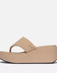 Side view of FITFLOP Classic Beige wedge sandals in Canada with ergonomic cushioning and sleek 90s silhouette