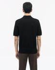 Back view of TIGER OF SWEDEN Araawen RWS polo shirt in Black featuring button-down collar from eightywingold