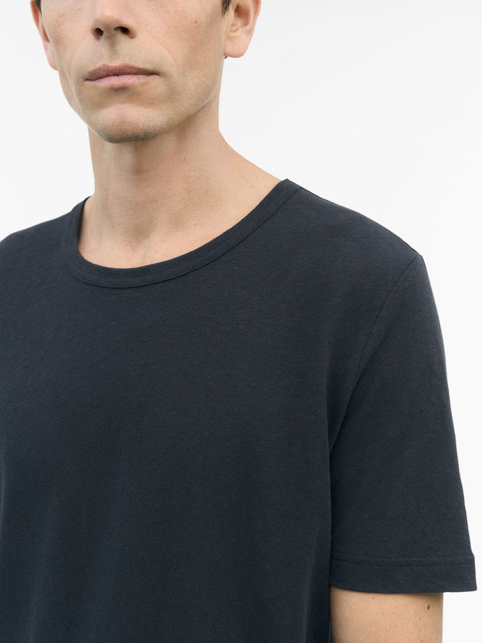 Close-up of TIGER OF SWEDEN chest logo on Olaf L linen blend t-shirt in Light Ink from eightywingold