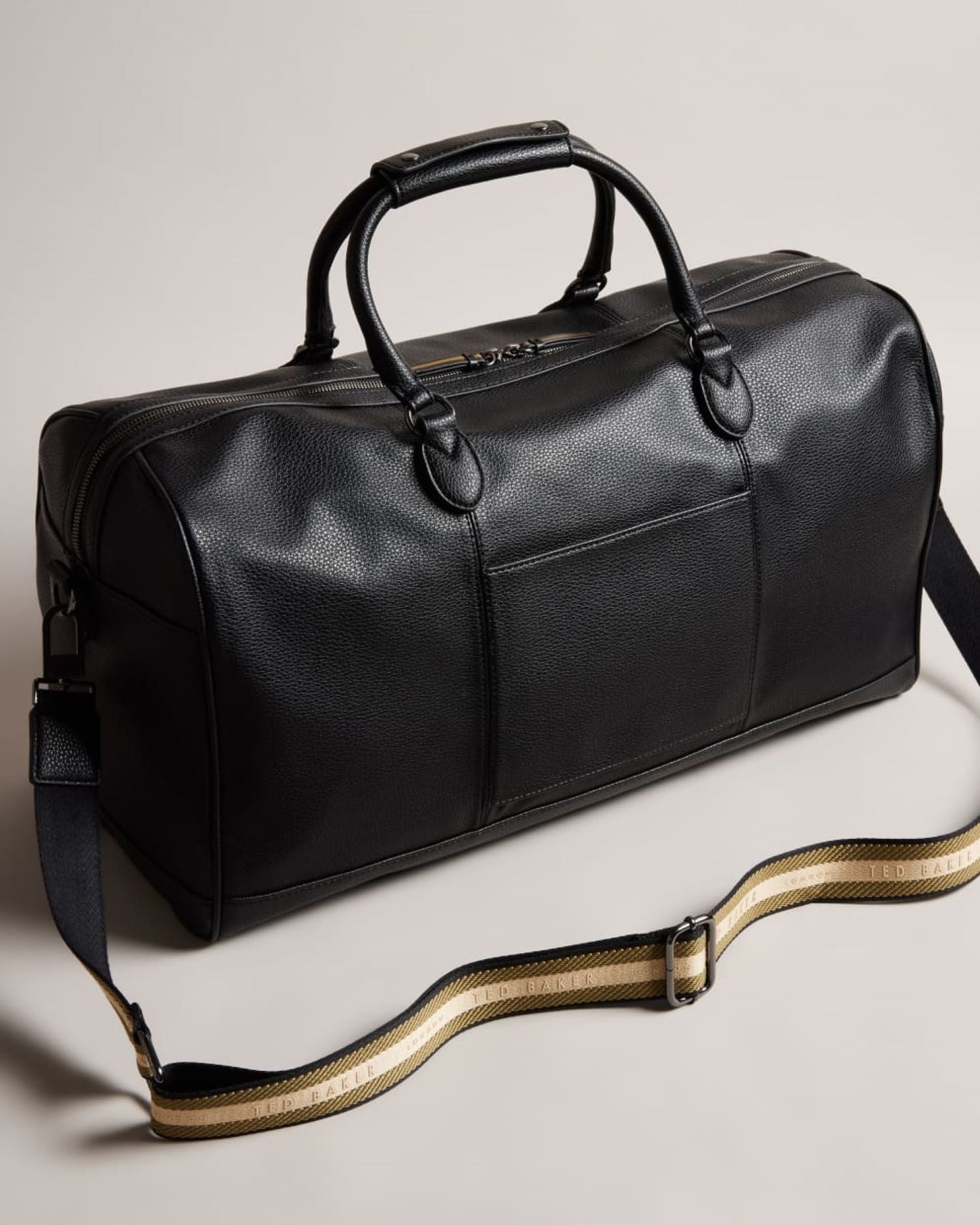 Ted Baker Kalvin Faux Leather Holdall In Black 270325 | Shop from eightywingold an official brand partner for Ted Baker in Canada and US.
