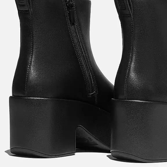 Leather heeled ankle boots with side zip, CushX™ cushioning, slip-resistant sole and ergonomic design for elevated all-day comfort.