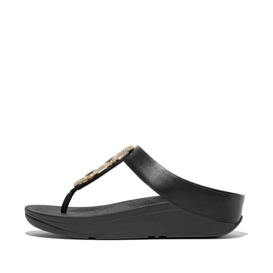 FitFlop HX2 001 Black women's sandals with soft leather straps, crystal-covered chain detail, and Microwobbleboard midsole for all-day comfort.