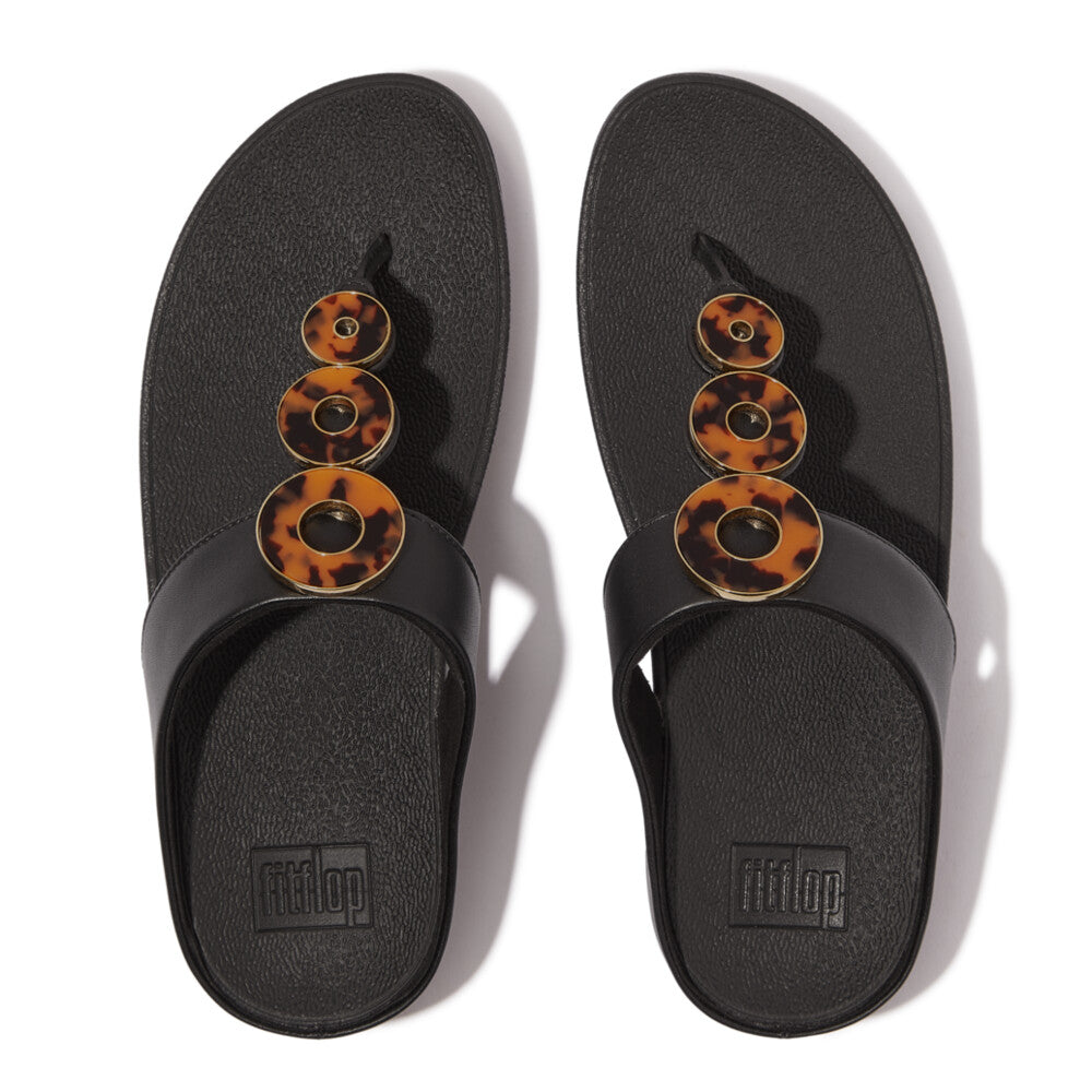All Black FitFlop IBO 001 ergonomic sandals for women featuring leather straps, triple black resin-ring accents, and APMA-approved arch support.