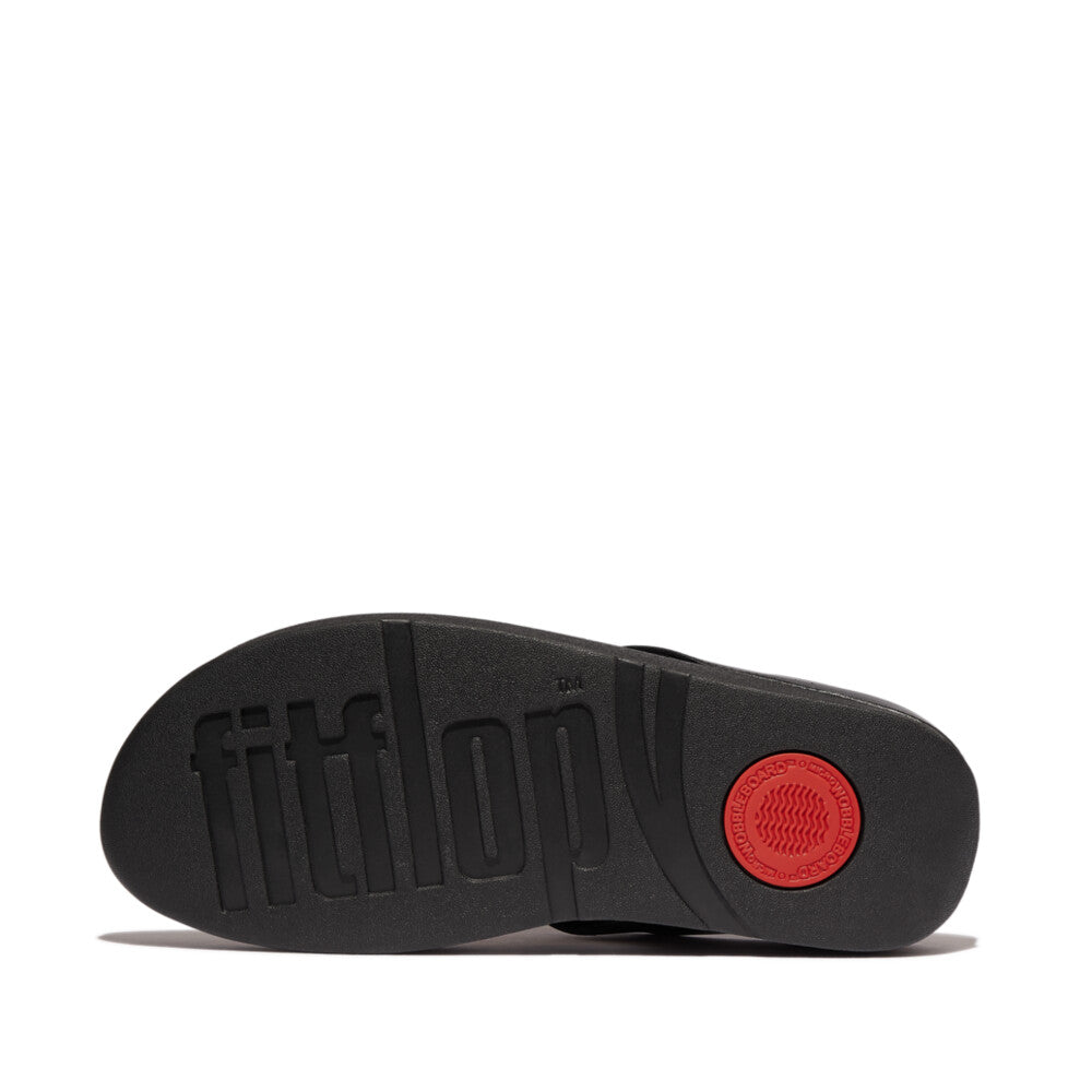Shop FitFlop IBO 001 All Black sandals in Canada – ergonomic women’s footwear with tonal detailing, cushioned support, and a minimalist look.