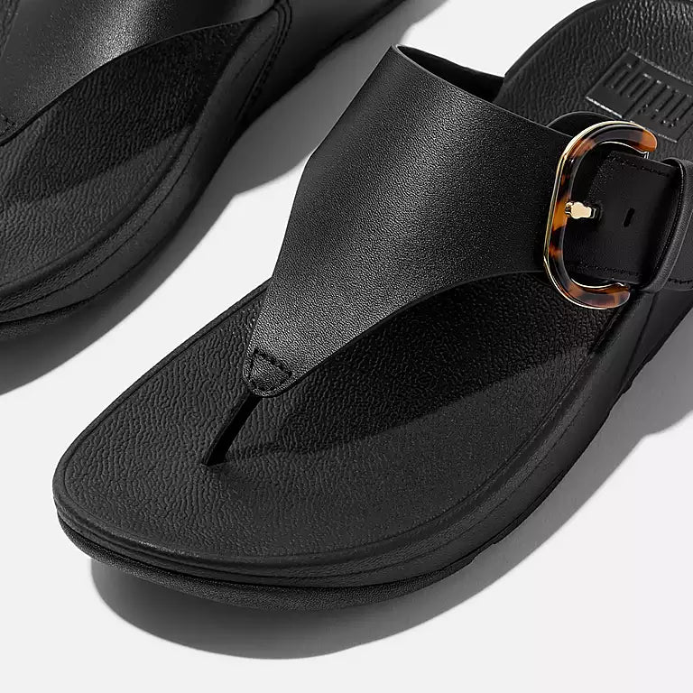 Black FITFLOP Lulu leather sandals in Canada with statement tortoiseshell buckle and ergonomic design