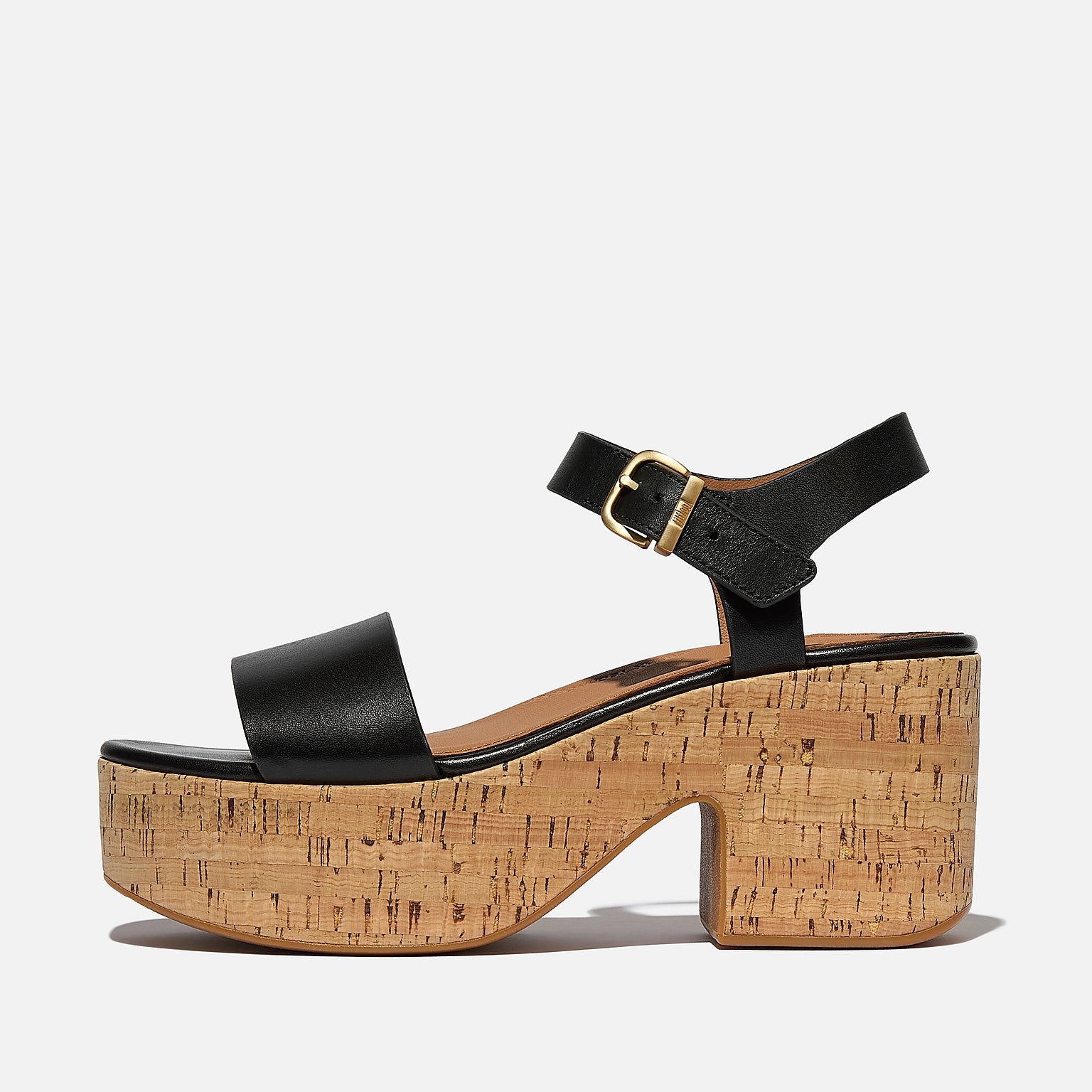 The CushX™ Platform Sandal JF7 -001 blends luxe leather, cork-wrapped soles, and a 70s-inspired silhouette with sneaker-level comfort | Shop from eightywingold an official brand partner for Fitflop Canada and US.