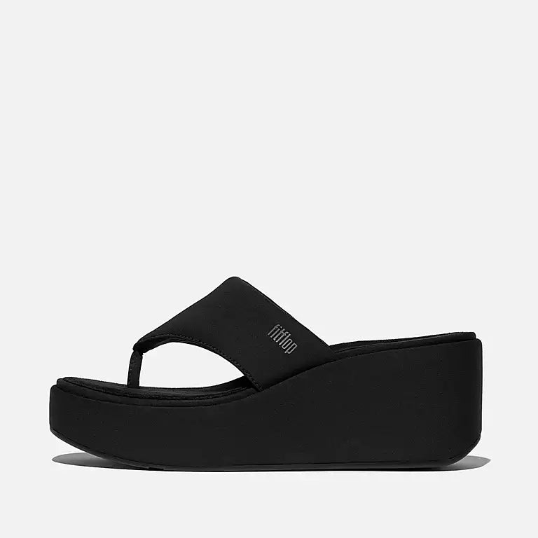 Side view of All Black FITFLOP high-heel sandals in Canada featuring CushX midsole and 90s-inspired silhouette