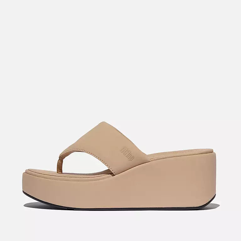 Side view of FITFLOP Classic Beige wedge sandals in Canada with ergonomic cushioning and sleek 90s silhouette