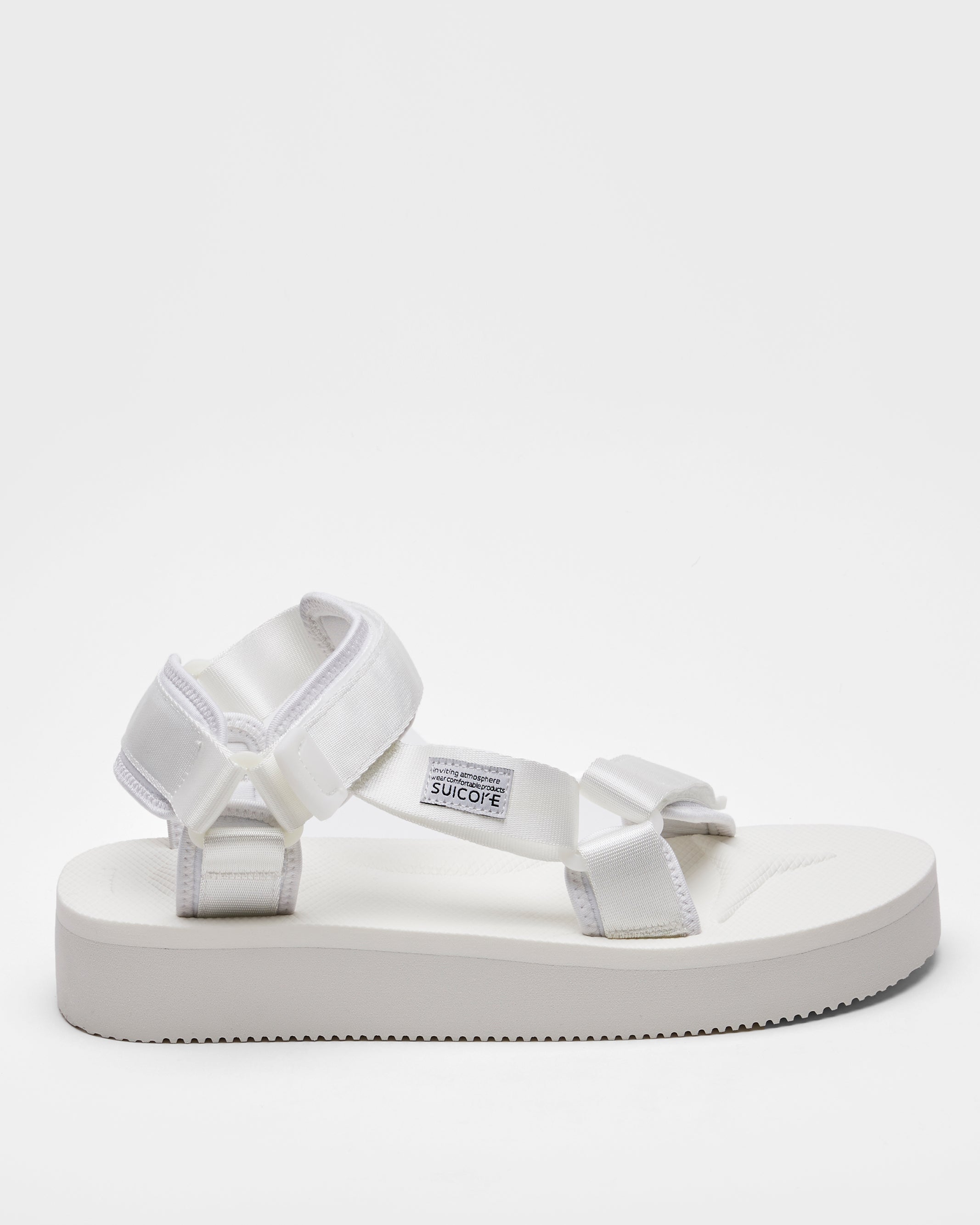 SUICOKE DEPA-2PO sandals with white nylon upper, white midsole and sole, strap and logo patch. From Spring/Summer 2023 collection on SUICOKE Official US & Canada Webstore. OG-022-2PO WHITE