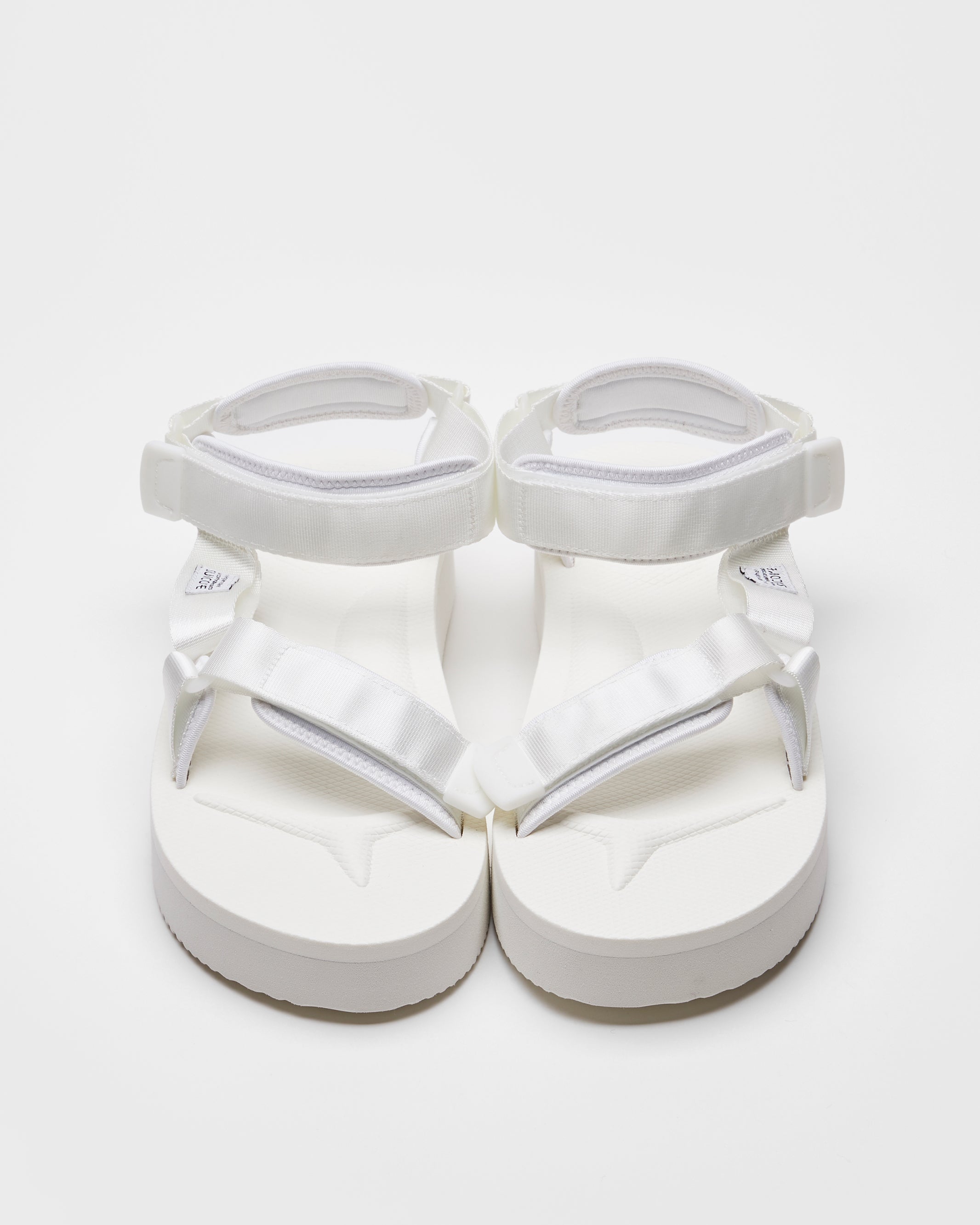 SUICOKE DEPA-2PO sandals with white nylon upper, white midsole and sole, strap and logo patch. From Spring/Summer 2023 collection on SUICOKE Official US & Canada Webstore. OG-022-2PO WHITE